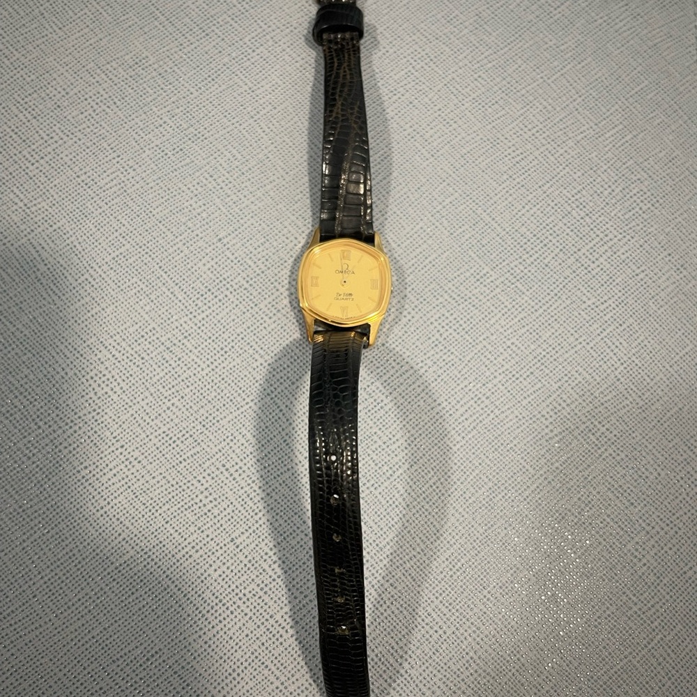 Omega women’s vintage black leather watch